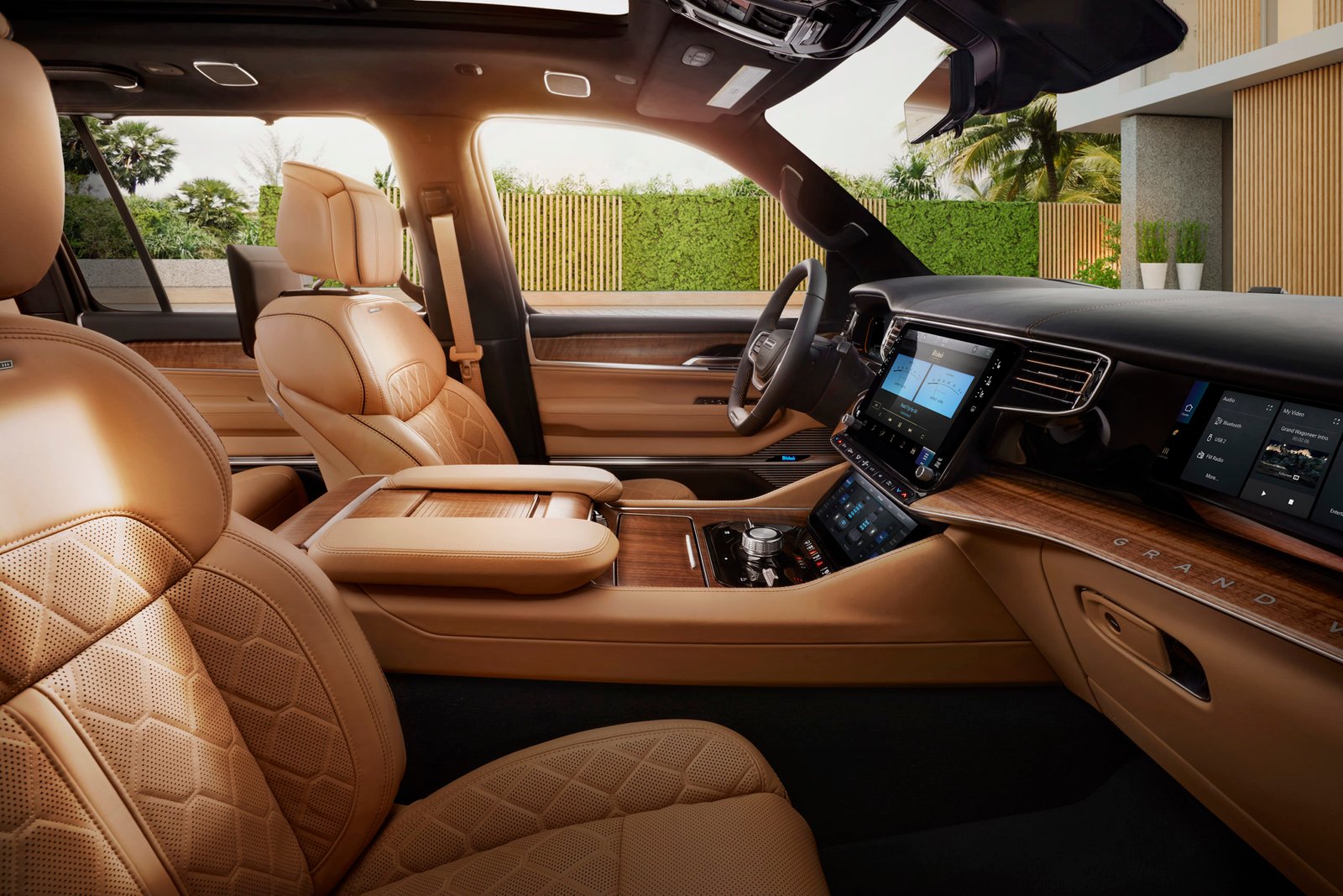 All-new 2022 Grand Wagoneer interior front row with Palermo leather seating with quilting and leather-wrapped instrument panel, consoles and door panels with accent stitching is available.