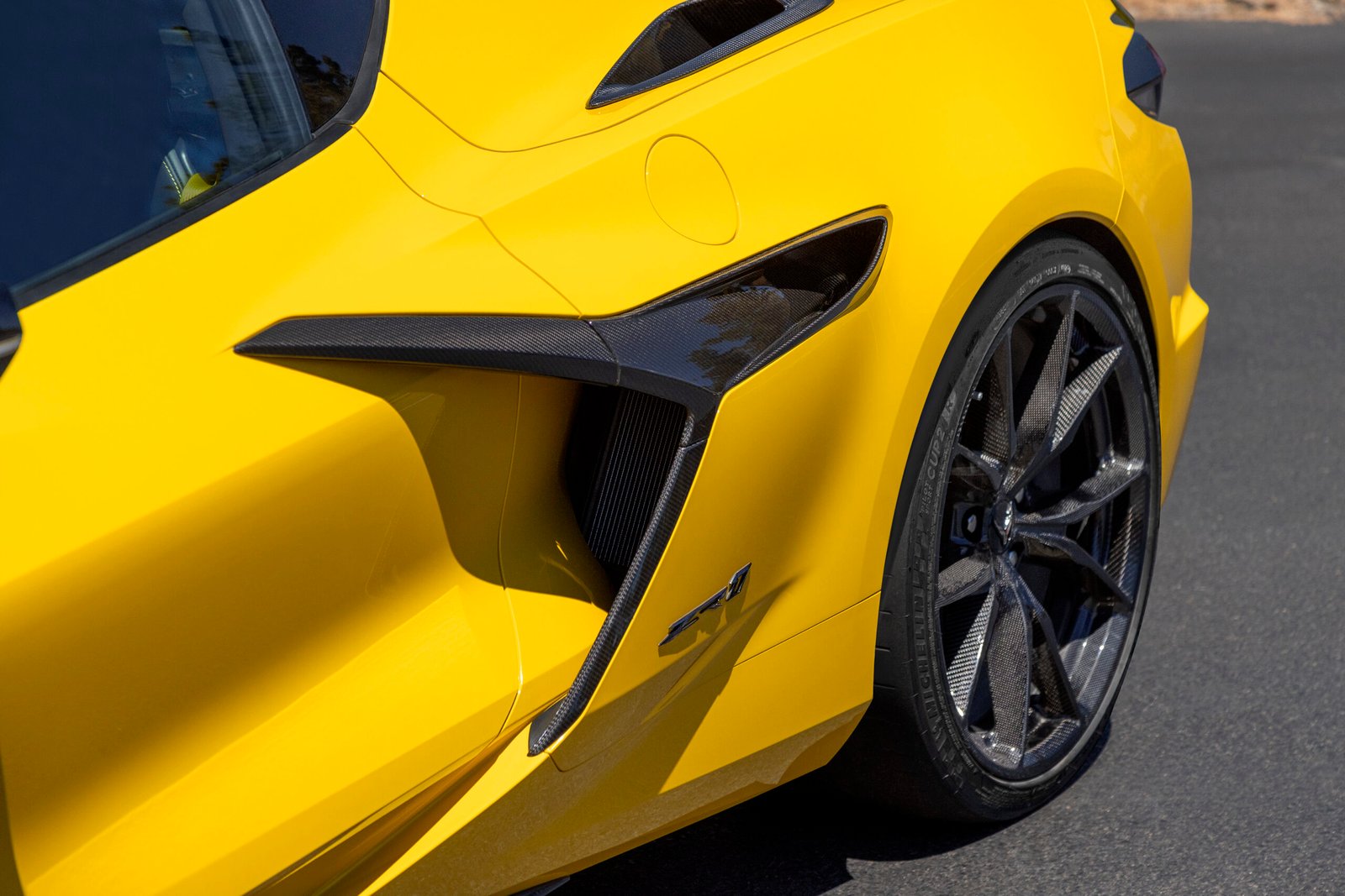 Close-up of Chevrolet Corvette ZR1 Coupe carbon fiber side profile air ducts. Preproduction model shown. Actual production model may vary.